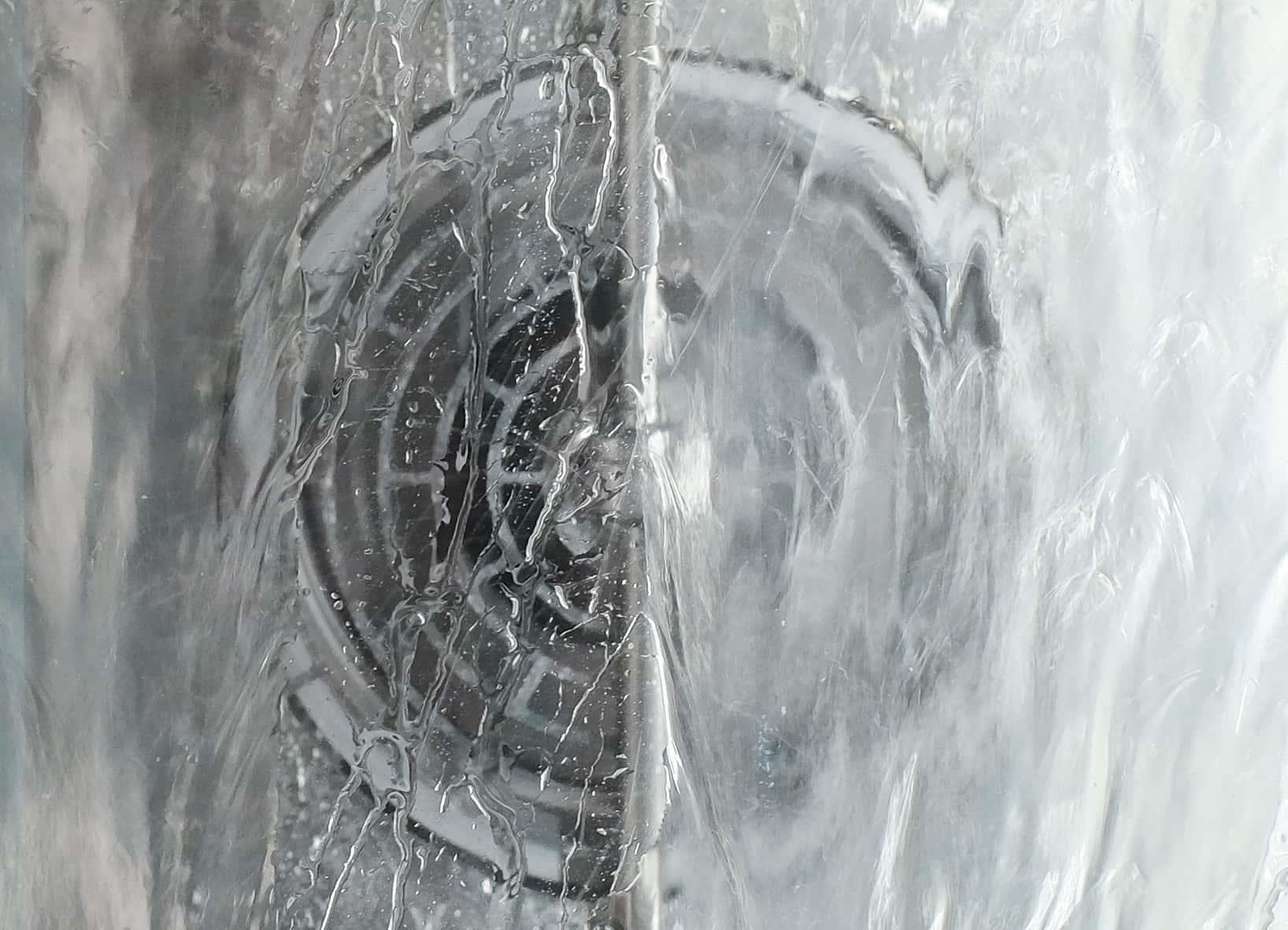 Close-up of a unox oven cooking chamber being cleaned during a wash cycle
