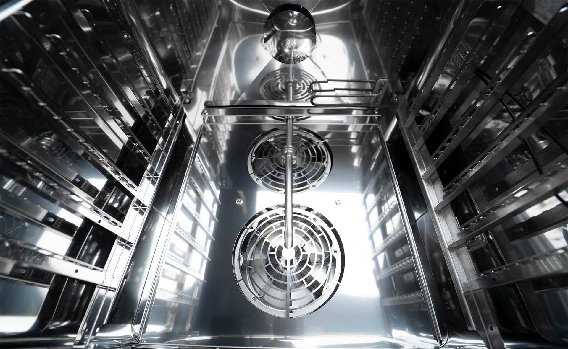 shiny stainless steel cooking chamber of a unox commercial oven