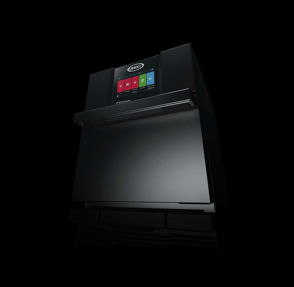Una imagen oscura y sombría de un horno rápido Unox, iluminada de forma que solo se ve una parte del horno, como el logotipo Unox y la pantalla digital.
